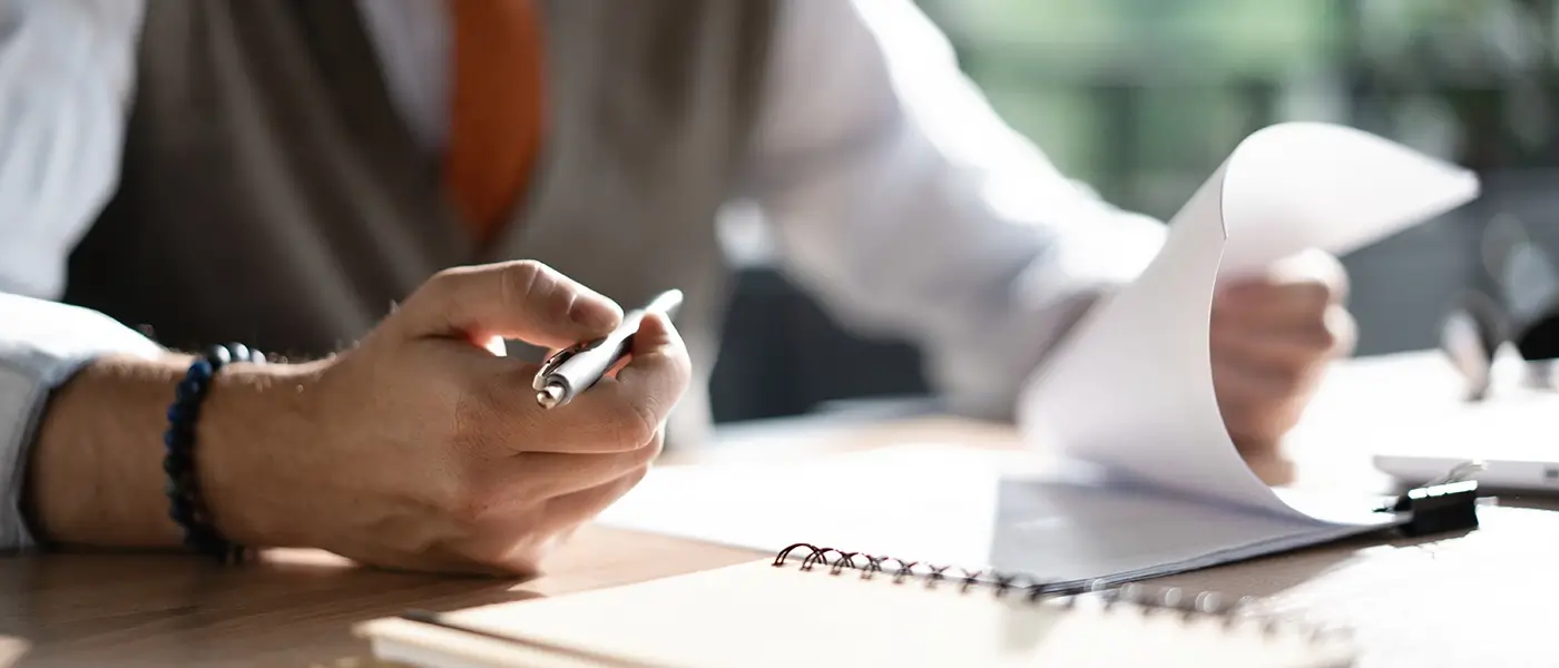 person reviewing papers