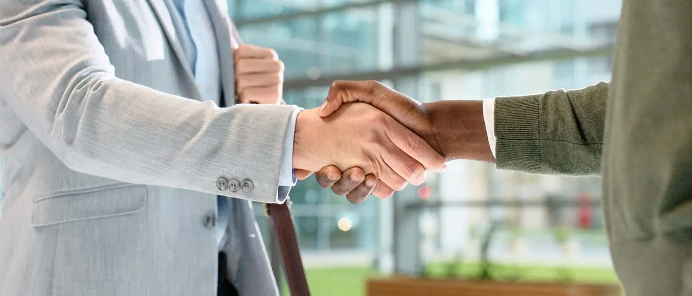 Handshake between two people